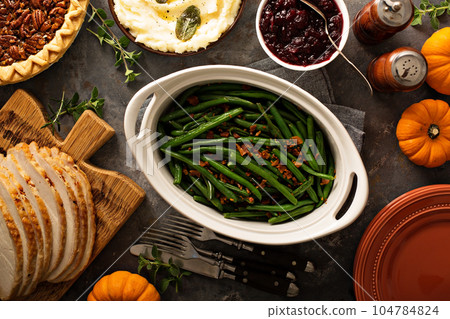 Green beans with bacon for Thanksgiving or Christmas dinner 104784824