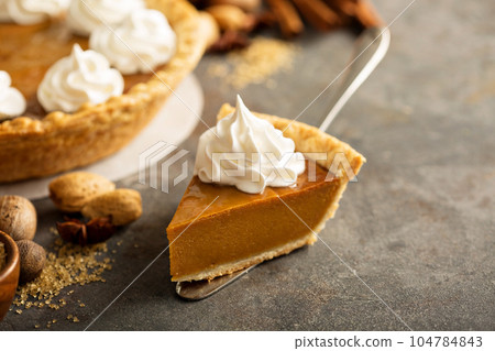 Pumpkin pie with whipped cream Pumpkin pie with whipped cream 104784843