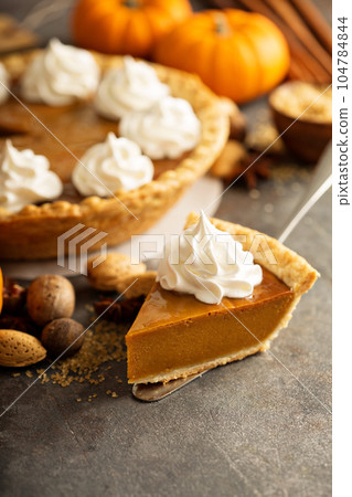 Pumpkin pie with whipped cream Pumpkin pie with whipped cream 104784844