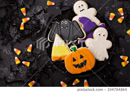 Halloween cookies decorated with royal icing 104784864