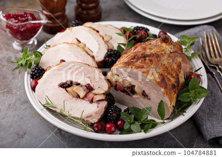 Roasted pork with apple filling Roasted pork with apple filling 104784881