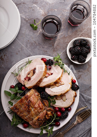 Roasted pork with apple filling Roasted pork with apple filling 104784882