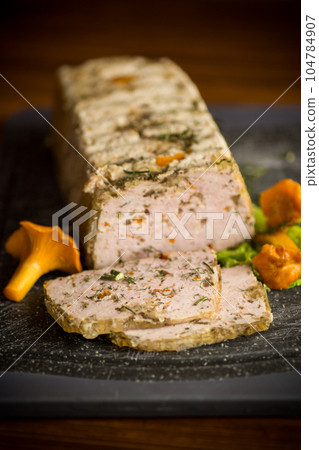 homemade sausage from minced meat with mushrooms and vegetables inside homemade sausage from minced meat with mushrooms and vegetables inside 104784907