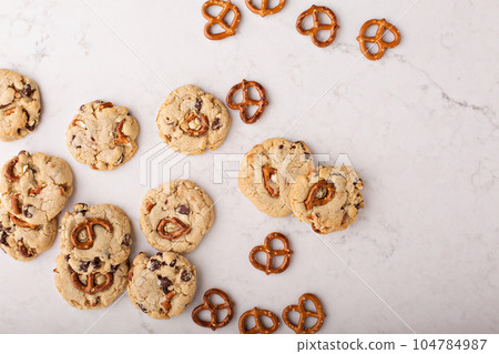 Chocolate chips and pretzels cookies on a marble table 104784987