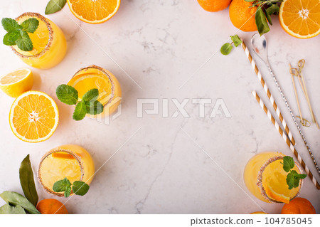 Orange and lemon margarita cocktail Orange and lemon margarita cocktail 104785045