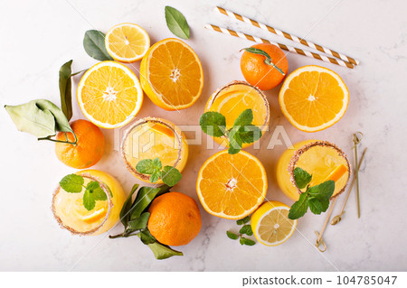 Orange and lemon margarita cocktail 104785047