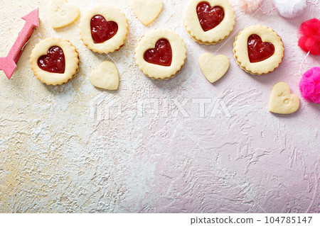 Vanilla cookies with strawberry filling Vanilla cookies with strawberry filling 104785147