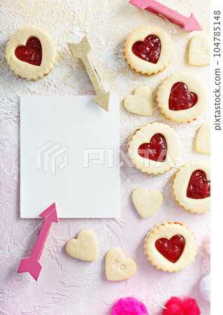 Vanilla cookies with strawberry filling 104785148
