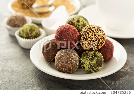 Healthy truffles with dates and nuts 104785236