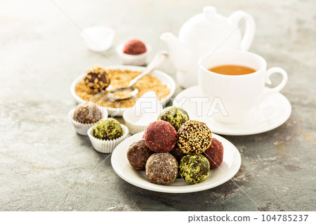 Healthy truffles with dates and nuts Healthy truffles with dates and nuts 104785237
