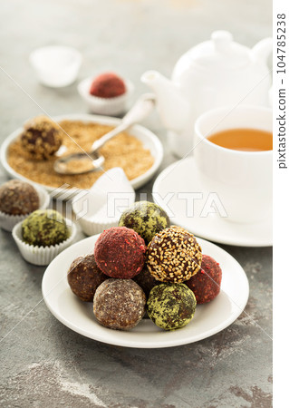Healthy truffles with dates and nuts 104785238