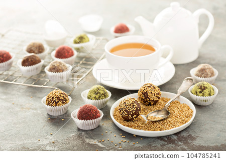 Healthy truffles with dates and nuts Healthy truffles with dates and nuts 104785241