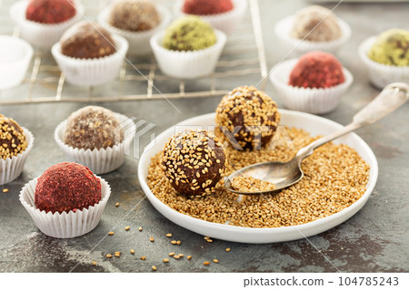 Healthy truffles with dates and nuts 104785243