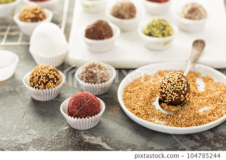 Healthy truffles with dates and nuts Healthy truffles with dates and nuts 104785244
