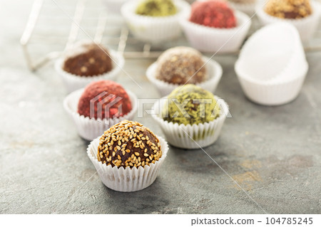 Healthy truffles with dates and nuts 104785245