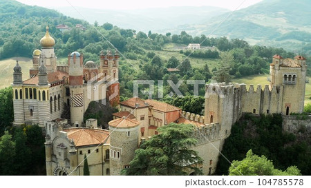 Aerial drone panoramic view of the Rocchetta Mattei castle in Italy on sunny summer day, view from above. High quality footage 104785578