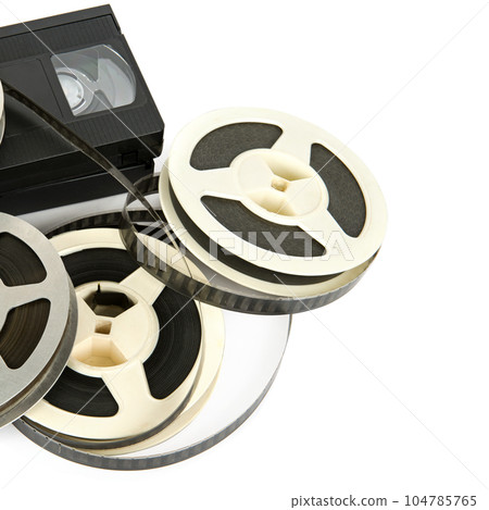 Film strip and videotapes isolated on white . Free space for text. 104785765