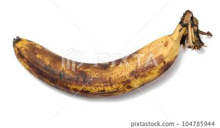 Overripe yellow banana isolated on white background, top view 104785944