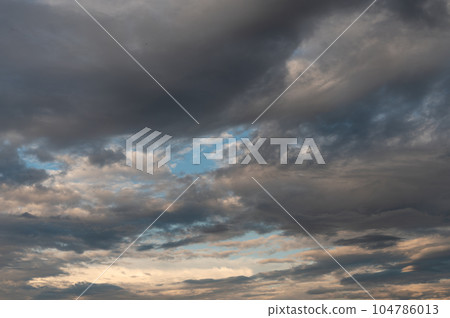 Cumulus clouds and gaps of clear blue sky. Cumulus clouds and gaps of clear blue sky. 104786013