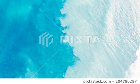 Top view of light blue water with white sand Top view of light blue water with white sand 104786287