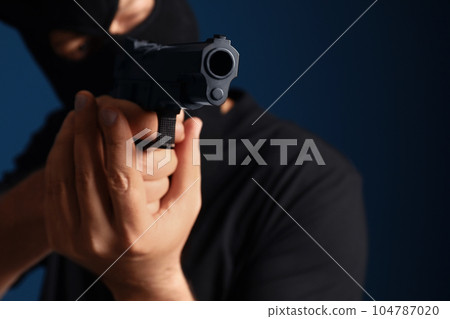Emotional courier with damaged cardboard box on blue background, closeup. Poor quality delivery Emotional courier with damaged cardboard box on blue background, closeup. Poor quality delivery 104787020