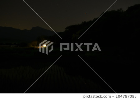 Takekawa-cho, Hokuto City, fireflies dancing over rice paddies around the time Mars falls over the mountains 104787083