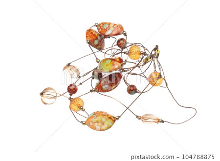 Silver wire jewel bead style necklet fly in air. Jewelry bead necklace as gemstone for fashion ornament decorative items. Fashion ornament necklace to add more style. White background isolated Silver wire jewel bead style necklet fly in air. Jewelry bead necklace as gemstone for fashion ornament decorative items. Fashion ornament necklace to add more style. White background isolated 104788875