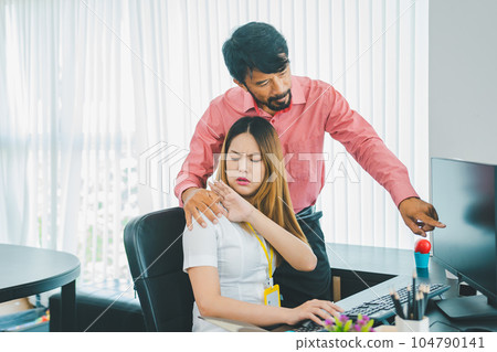 Boss or supervisor touching female employee's shoulder Causing young employees to resist because they are uncomfortable and afraid of being sexually abused. Concept of sexual harassment in the Boss or supervisor touching female employee's shoulder Causing young employees to resist because they are uncomfortable and afraid of being sexually abused. Concept of sexual harassment in the 104790141
