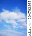 White clouds floating in the blue sky 104792865