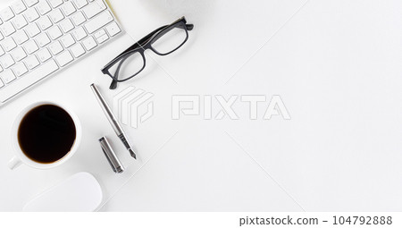 Flat lay, top view office table desk. Workspace with keyboard, office supplies on white background. 104792888