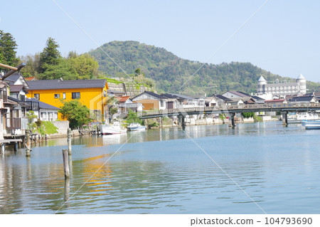 View of fishing boats and private houses along the Yao River in the Oki Saigo district View of fishing boats and private houses along the Yao River in the Oki Saigo district 104793690
