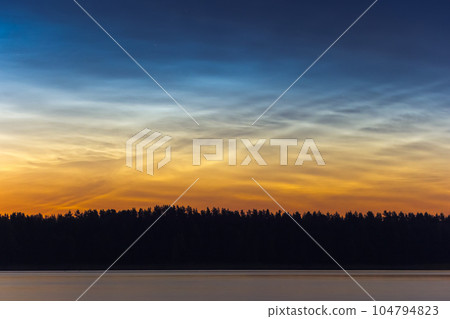 Night landscape with Noctilucent clouds at Lithuania 104794823