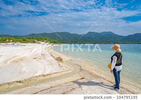 Mt. Osore, Lake Usoriyama, Gokurakuhama, a woman standing Mt. Osore, Lake Usoriyama, Gokurakuhama, a woman standing 104795195