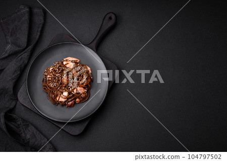 Delicious fresh buckwheat noodles with boiled tiger prawns, salt, spices and mushrooms Delicious fresh buckwheat noodles with boiled tiger prawns, salt, spices and mushrooms 104797502