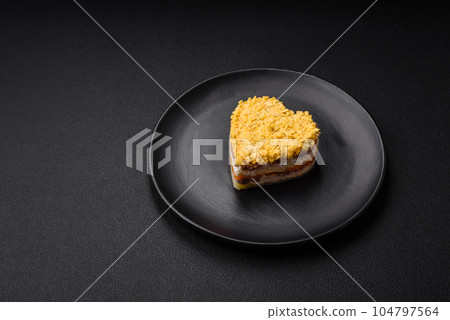 Delicious fresh mimosa salad with canned fish, egg, moinese, cheese, salt and spices Delicious fresh mimosa salad with canned fish, egg, moinese, cheese, salt and spices 104797564