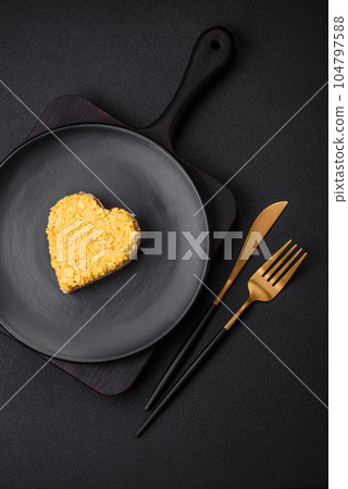 Delicious fresh mimosa salad with canned fish, egg, moinese, cheese, salt and spices 104797588