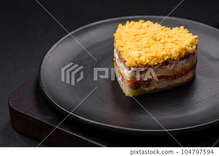 Delicious fresh mimosa salad with canned fish, egg, moinese, cheese, salt and spices 104797594