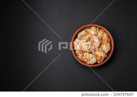 Delicious boiled beef or pork tongue sliced with carrots, onions, sour cream and spices Delicious boiled beef or pork tongue sliced with carrots, onions, sour cream and spices 104797607
