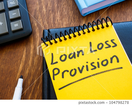 Loan loss provision handwritten in a notepad. 104798278
