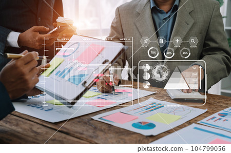Project manager working and update tasks with milestones progress planning and professional investor working new start up project in the office. Project manager working and update tasks with milestones progress planning and professional investor working new start up project in the office. 104799056