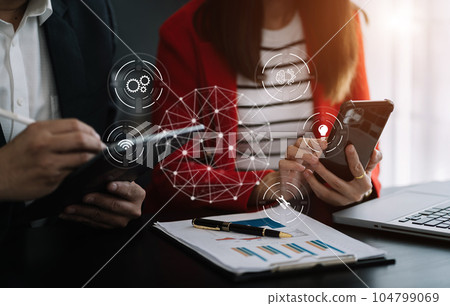 Businessman team thinking ideas strategy working concept at the desk in the office. 104799069