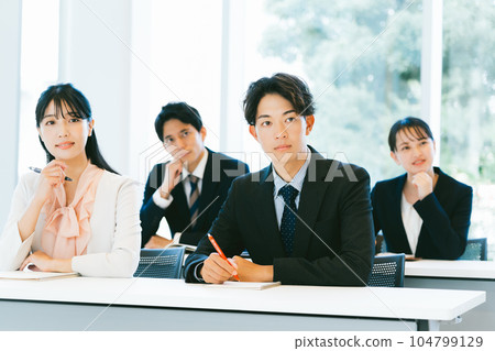 Working people taking seminars 104799129