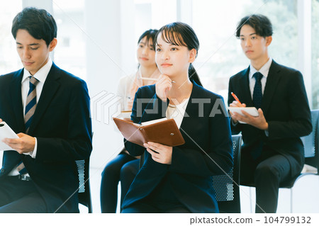 Working people taking seminars 104799132