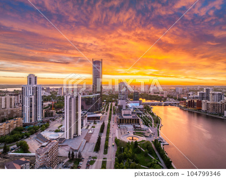 Yekaterinburg city and pond aerial panoramic view at summer sunset. 104799346