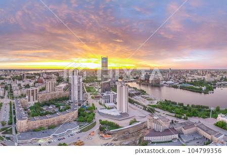 Yekaterinburg city with Buildings of Regional Government and Parliament, Dramatic Theatre, Iset Tower, Yeltsin Center, panoramic view at summer sunset. 104799356