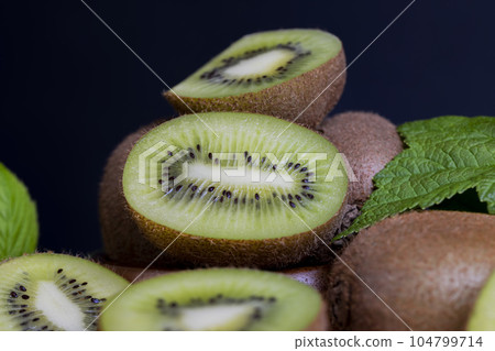 kiwi fruit cut into slices kiwi fruit cut into slices 104799714