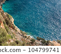 A view from the top of a cliff over the Mediterranean Sea. 104799741