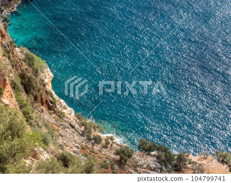 A view from the top of a cliff over the Mediterranean Sea. 104799741