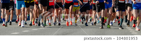 legs group of runners men and women run marathon race, panoramic view sports event 104801953
