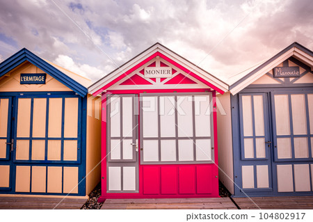 Colorful beach huts in Cayeux, Normandy, France Colorful beach huts in Cayeux, Normandy, France 104802917